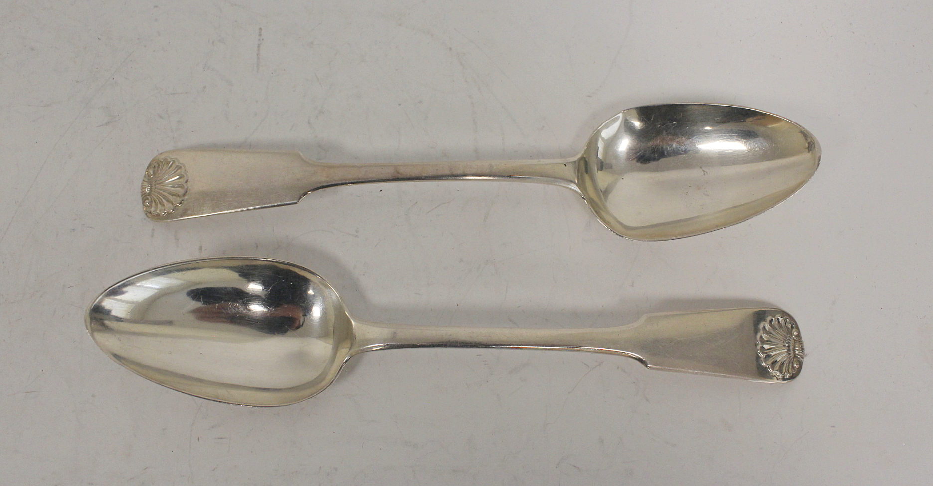 Set of twelve silver dessert spoons, fiddle and shell seven with mark P, struck separately four - Image 2 of 4