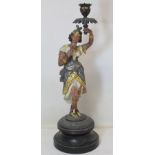 Late 19th/early 20th century spelter figural candlestick in the form of an Egyptian girl with asp
