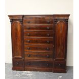 Victorian mahogany wardrobe, the centre section fitted with four drawers flanked by a pair of