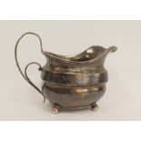 Silver cream jug with engraved band on ball feet by A & G Burrows, 1817. 5 1/2oz