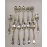 Set of twelve silver dessert spoons, fiddle and shell seven with mark P, struck separately four