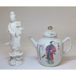 Small Chinese porcelain Famille Rose teapot of ovoid form decorated with figures in polychrome