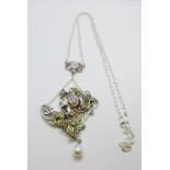 Art nouveau style silver necklace set with opals, marcasite, rubies, plique-a-jour and a suspended