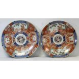 Pair of Japanese Meiji period large circular chargers decorated with panels of phoenix and birds