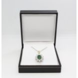 18ct yellow gold oval; emerald and diamond cluster pendant. Emerald 1.00ct approx. Diamonds 1.25ct