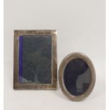 Silver rectangular photo frame, plain by W Comyus 1896 12.5cm x 8,5cm aperture and another oval 9