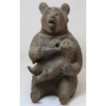 Black Forest carved wooden inkwell in the form of a mother bear bottle feeding a baby bear,