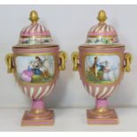 Pair of Sevres covered vases of twin handled urn form, the pink and gilt grounds with panels of