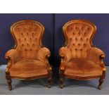 Pair of Victorian mahogany framed ladies and gentlemens` chairs with button backs on fluted turned