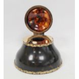 Tortoiseshell and gold inkwell of spreading shape with domed hinged cap and pierced floral reeded