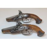 Pair of French 18th century style double barrel side by side flintlock pistols, the cylindrical