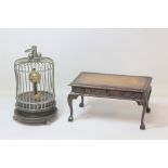 Early 20th century Japanese timepiece in the form of a bird in a cage, the central revolving globe