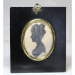 19th century English silhouette portrait of a lady, black gouache heightened with gilt, 7.5cm x