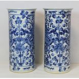 Pair of Chinese blue and white vases of cylindrical form, each decorated with two four-clawed