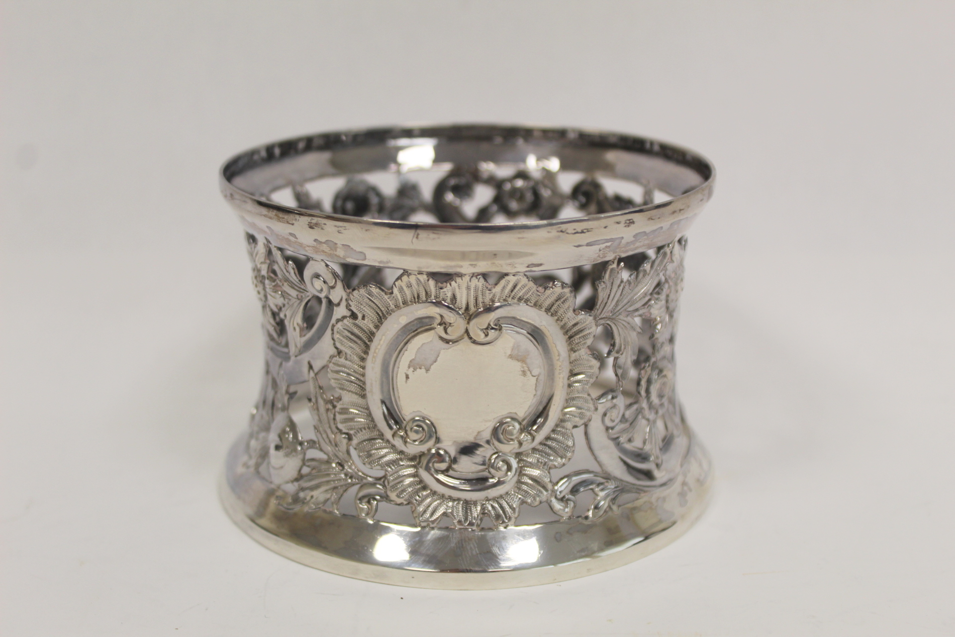 Small Irish silver 'potato ring' embossed and pierced with a bird, dolphin, scrolls and flowers, - Image 2 of 3