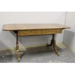 Regency rosewood veneered sofa table of typical design, satinwood banding with sabre supports and
