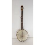 Five string banjo with skin drum, rosewood fretboard & bone tuners.