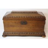 19th century rosewood veneered tea caddy of sarcophagus form with beaded borders, twin ring