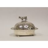 Silver butter dish with waved edge and pierced cover with finial, by John Murray, Glasgow 1858.