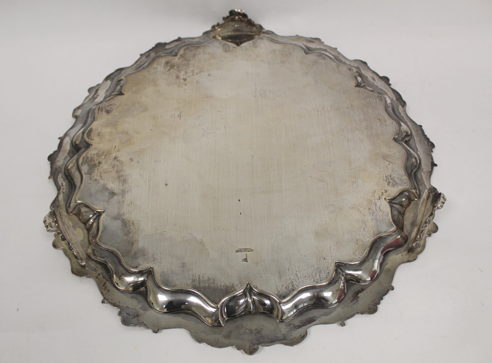 Silver circular tray with shaped moulded floral and leafage border on similar feet, by Walker & - Image 3 of 5