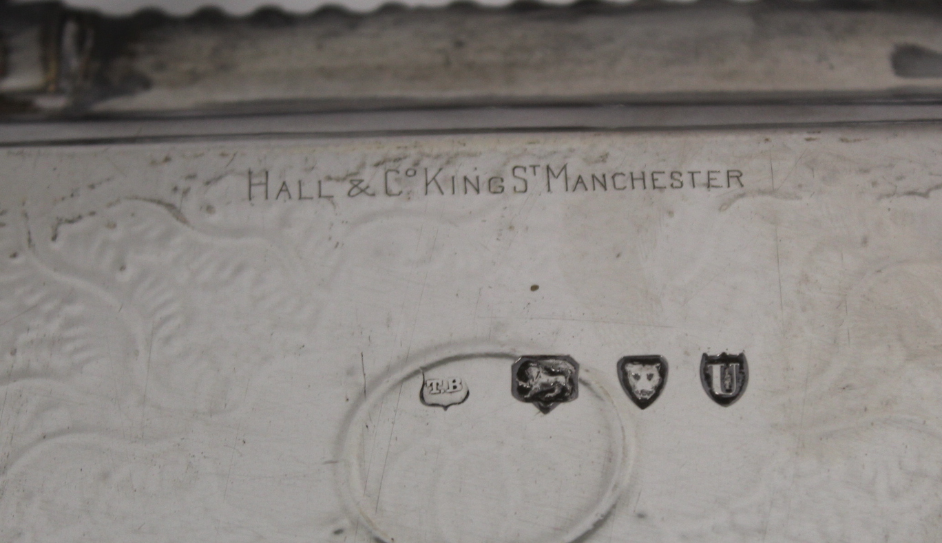 Good late Victorian silver tea tray, rectangular with rounded corners, embossed scrolls, flowers and - Image 4 of 4