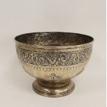 Silver vase or punch bowl, hemispherical with embossed band and leafage on moulded foot by