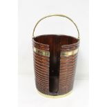Georgian mahogany brass bound plate bucket of ribbed cylindrical form. 36cm diameter.