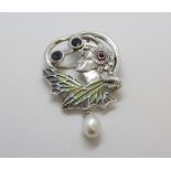 Art Nouveau style silver brooch/pendant depicting a lady set with two sapphires, a ruby, plique-a-