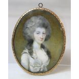 Georgian portrait miniature of a lady, watercolour on ivory, 7.5cm x 6cm (oval), signed with