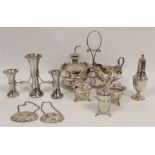 Silver triple vase epergne, four condiments, two spirits labels, an oil bottle and an e.p. sugar and