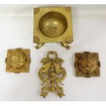 Two Victorian or Edwardian moulded armorial brass paperweights of domed square form (one