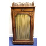 Victorian walnut music cabinet with fret cut back rail, inlaid stringing and scrolling,