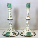 Pair of late 18th century English enamel candlesticks decorated with floral sprays and turquoise