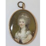 Georgian portrait miniature of a lady, watercolour on ivory, 8.5cm x 6.5cm, indistinctly signed with