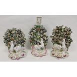 18th century Chelsea porcelain three piece rabbit candlestick garniture, each with large bocage back