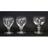 Pair of 19th century clear glass rummers with rounded funnel bowls on short knopped stems and