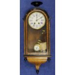 19th century pendulum wall clock with blue & white roman numeral dial. oak cased with black urn