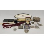 Silver circular box '800', various coins, beads and other items.
