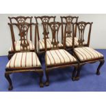 Set of eight Reprodux Chippendale style dining chairs, slip in seats, on cabriole supports with ball