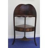 George III mahogany inlaid corner washstand of typical design.