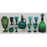 Eleven pieces of 19th century and later green glass comprising: decanter of globe and shaft form