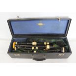 Antique Highland bag pipes in fitted hard case by London maker H .Starck with later Macpherson