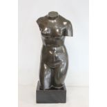 20th century patinated metal sculpture of a female torso on ebonised square plinth base, approx.