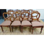 Set of twelve Victorian mahogany framed balloon back dining chairs, on turned supports