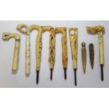Collection of seven Victorian/Edwardian bone and ivory parasol handles with pierced and carved