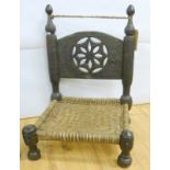 North West Frontier/North Pakistan tribal low chair with carved and pierced back and gut string seat