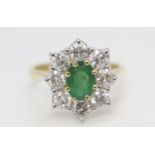 18ct yellow gold oval emerald and diamond cluster ring. Emerald 1.15ct. Diamonds 1.25ct