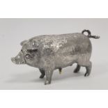 Good cast silver table bell, realistically modelled as a pig, with actuating snout and tail, by