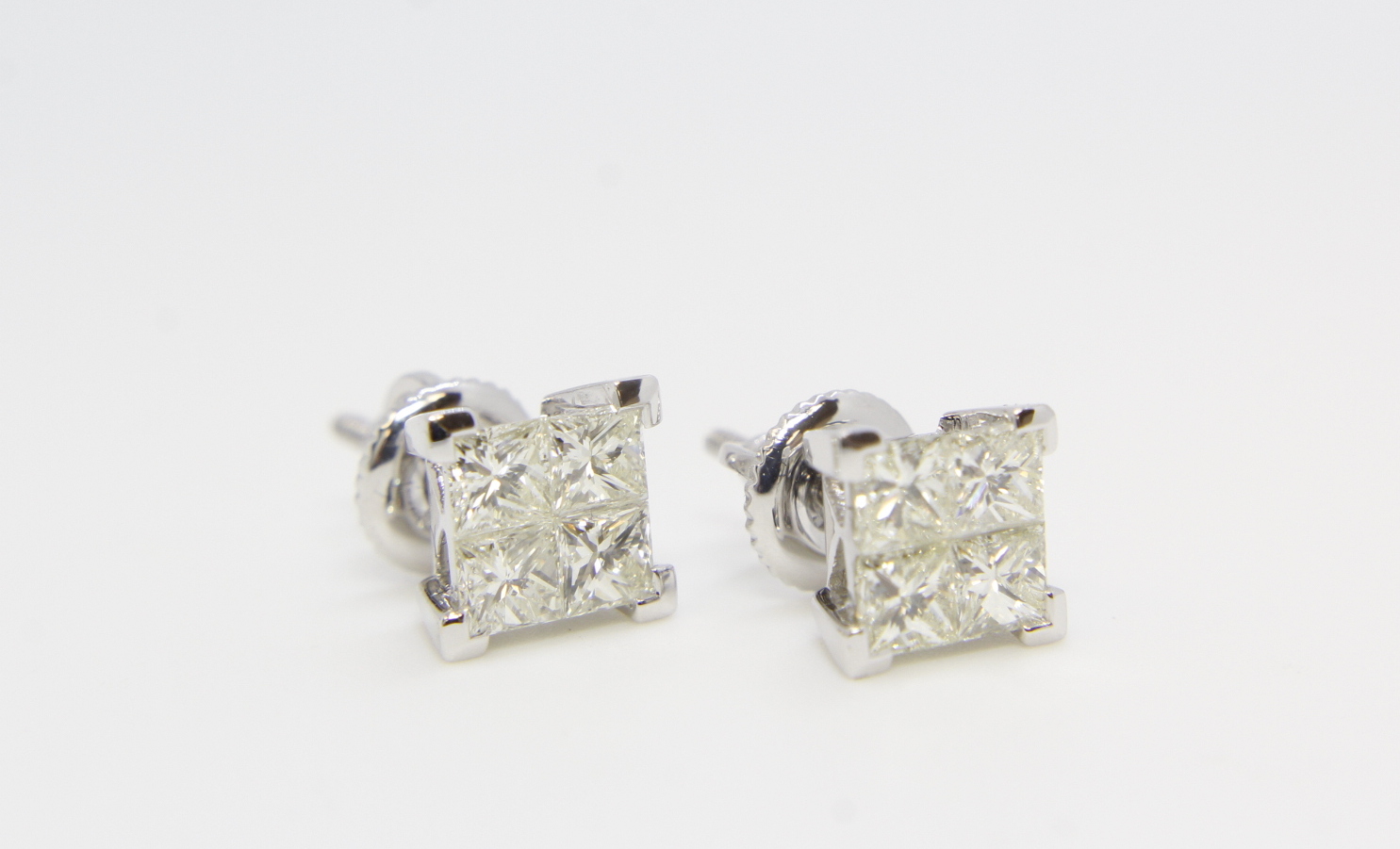 Pair of  18ct gold invisible set princess cut diamond stud earrings. Diamonds 1.50ct approx - Image 2 of 4