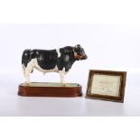 Royal Worcester porcelain model of a British Friesian Bull modelled by Doris Lindner on wooden